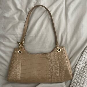 Tan shoulder bag in mint condition.